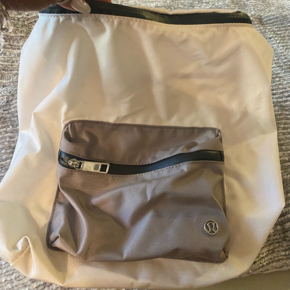 Lululemon Athletica White and Tan Backpack
Good used condition! Everyday use .